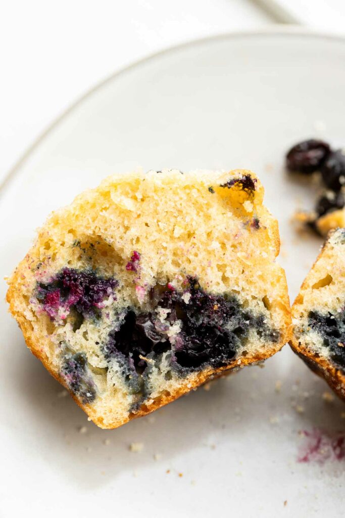 cross section view of a muffin test using only baking powder as the leavening - the result is denser and not as tall as the ones made with baking powder and baking soda