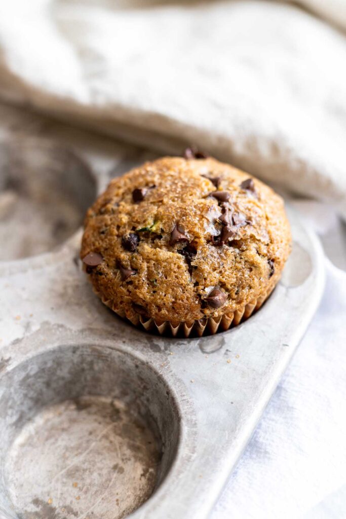 close up view of a baked muffin fresh out of the oven