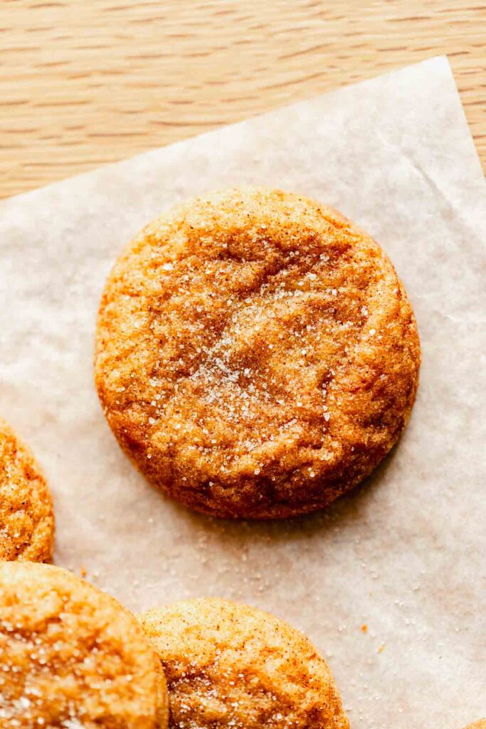 close up of a finished pumpkin spice snickerdoodle showing the cinnamon sugar coating