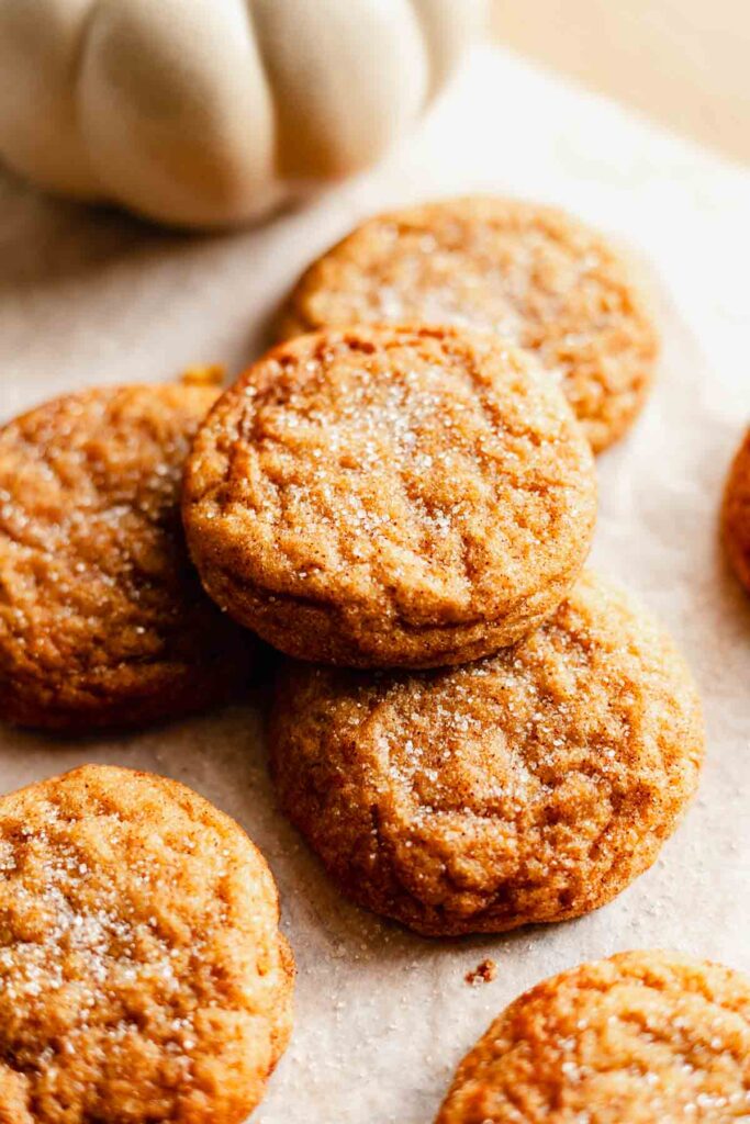 a few cookies stacked on top of each other on a white surface